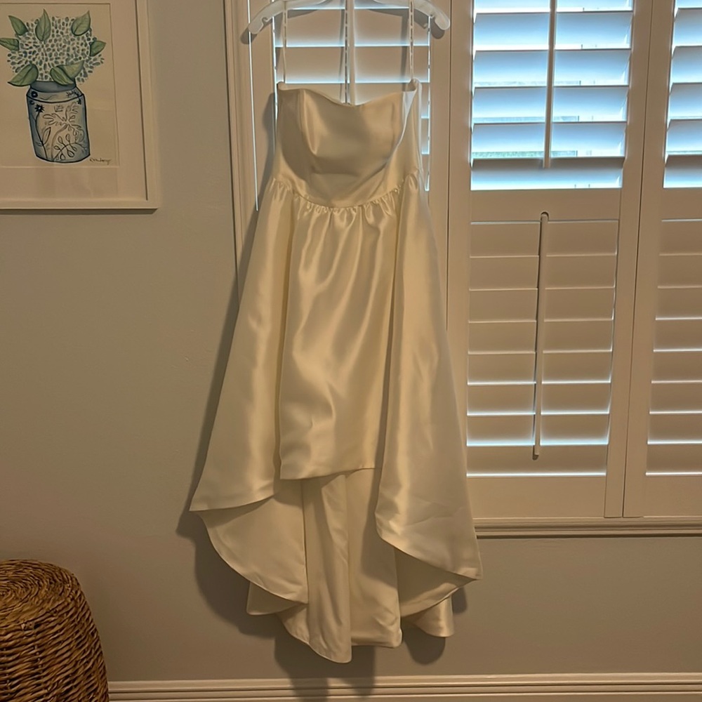 DB Studio strapless, high low white dress. Only worn once and no alterations!